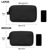 Black Bagsmart cosmetic toiletry bag shown next to an iPhone for size comparison.