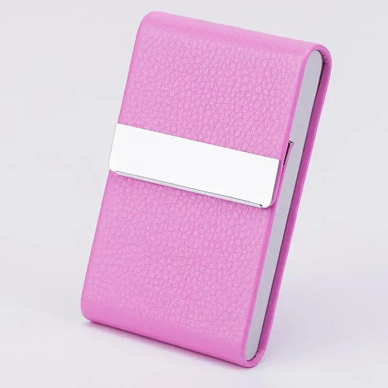 A pink elegant PU leather business card holder with a silver closure bar.