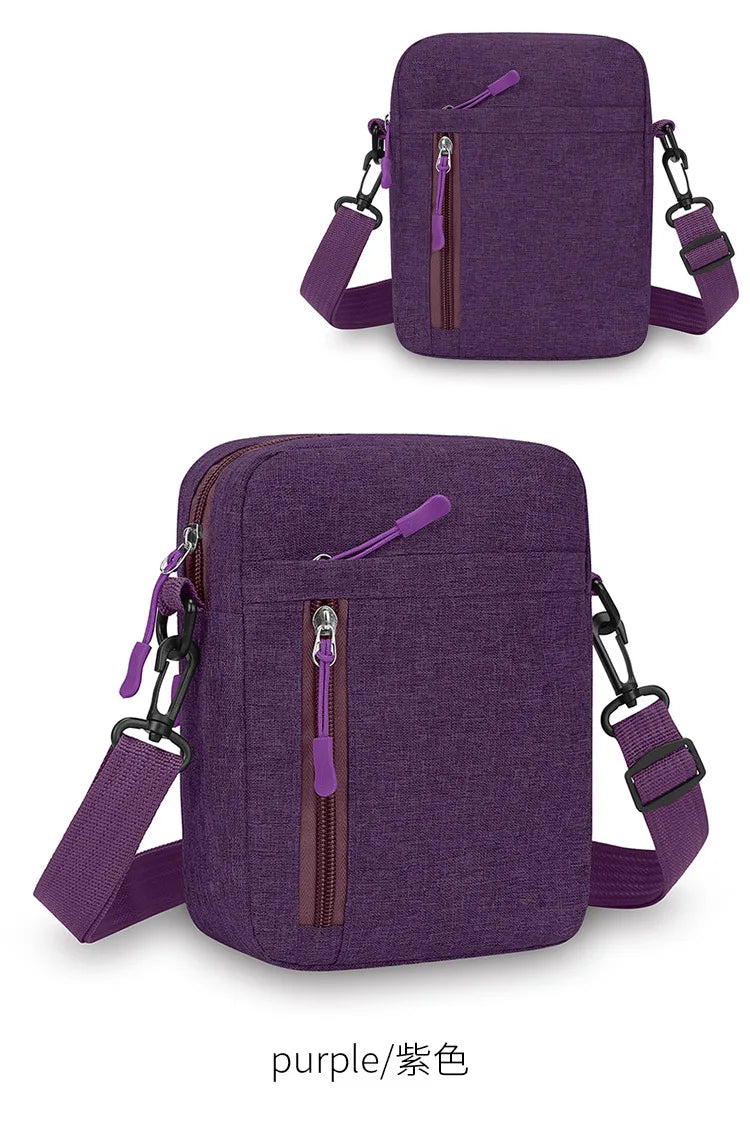 A purple lightweight nylon crossbody shoulder bag with a zipper and adjustable straps.