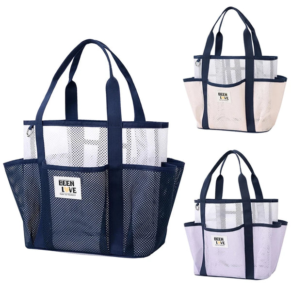 A packable mesh beach tote in navy blue and light beige with handles and multiple pockets.
