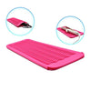 A bright pink heat-resistant silicone mat used for styling tools, shown with close-ups of its texture and use.