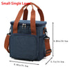 A navy blue insulated lunch bag with brown straps and a separate front pocket.