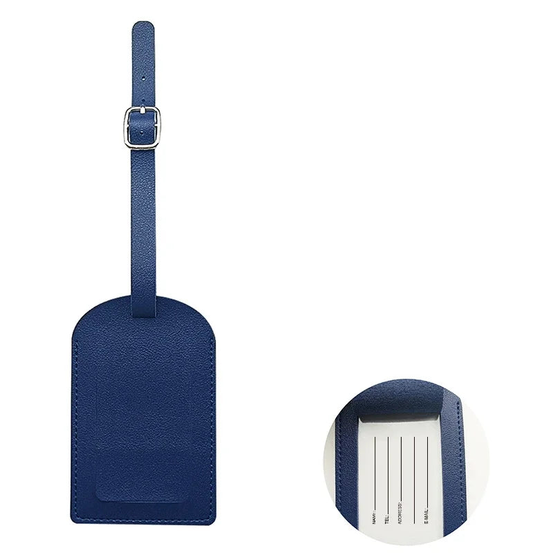 A dark blue PU leather luggage tag with a strap and an ID card holder slot.