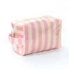 Sac de rangement cosmétique rayé rose et crème avec poche zippée.
