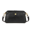 A black genuine leather crossbody bag with a flap and gold-toned hardware.