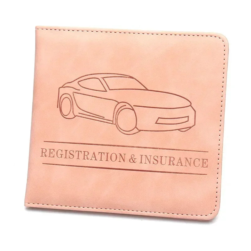 A light pink PU leather glove box wallet with a line drawing of a car and the text Registration & Insurance.