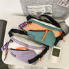 A beige nylon chest rig bag is shown next to a packet of Hydration Pack and a digital thermometer.