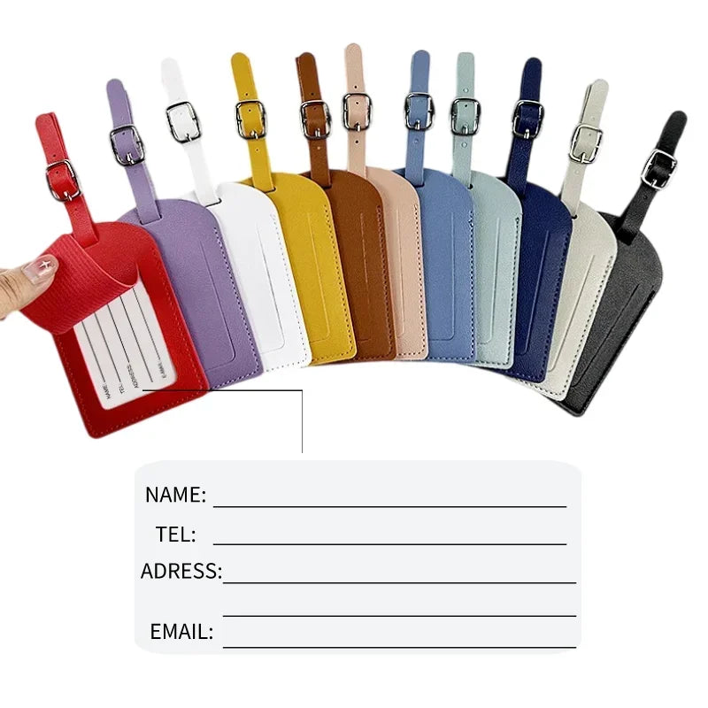 A row of colorful PU leather luggage tags with ID card holders displayed horizontally.