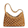 A tan luxury metal rivet shoulder bag with a textured surface and gold-toned hardware.