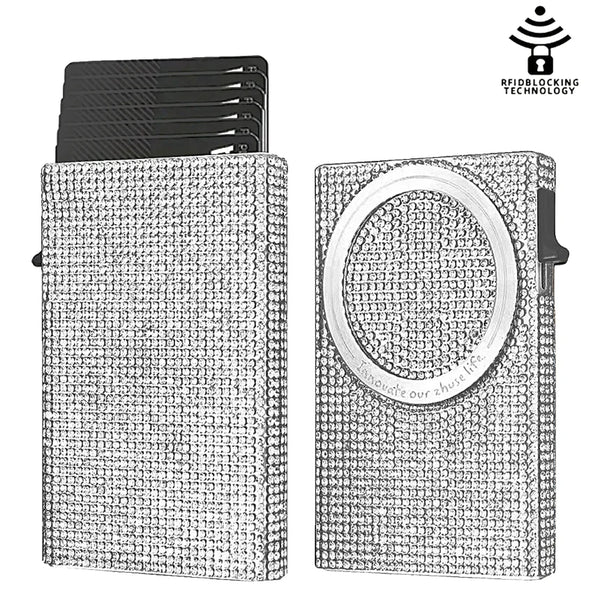 A silver magnetic card holder wallet with a textured surface and a black card slot.