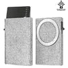 A silver magnetic card holder wallet with a textured surface and a black card slot.