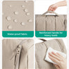 Bolsa de viaje beige para herramientas de cabello con asa reforzada, cremalleras suaves y tela fácil de limpiar.
