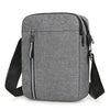 A gray durable waterproof crossbody bag for men shown from the front.