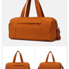 A tan Oxford gym duffel bag with carrying straps shown in multiple views.