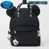 Mochila de peluche de ratón pato negro con detalle de cremallera.