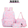 Pink star-patterned nylon backpack set featuring a main backpack and a matching pouch