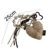 Brown leather heart pendant keychain featuring pearl beads and a long tassel