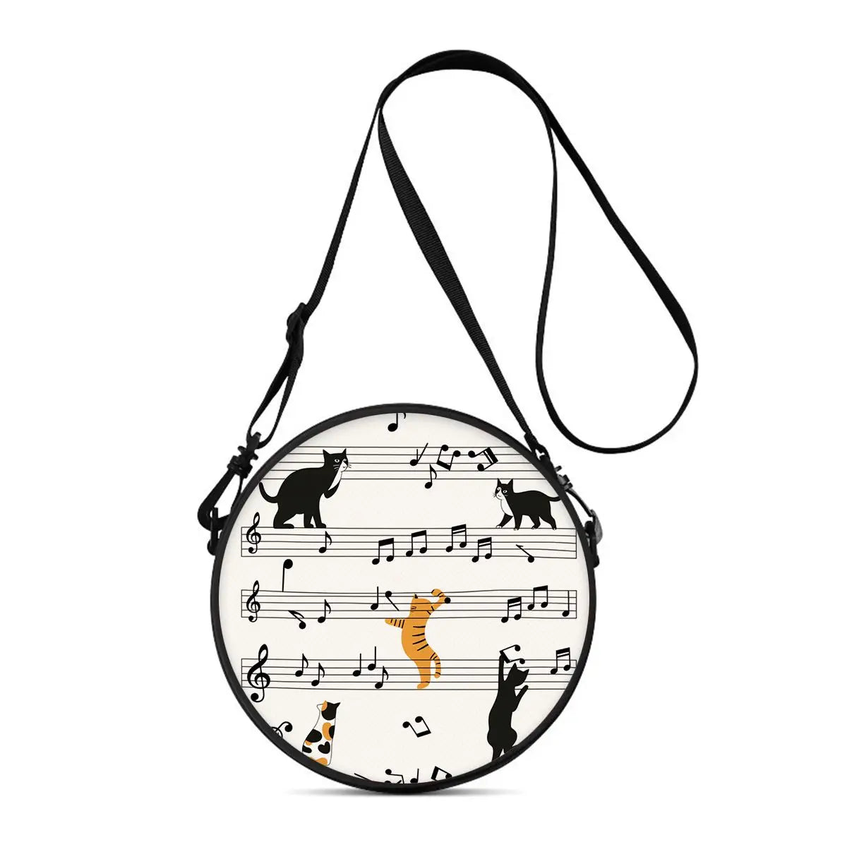 A black cartoon cat round crossbody bag with a long strap and sheet music design.