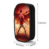A black zippered pencil case featuring a soccer player, Ronaldo, in a red jersey against a dramatic background.