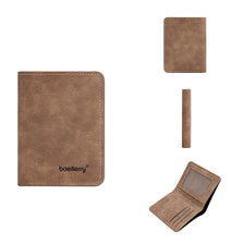 A brown leather slim bi-fold wallet with a stitched edge and a separate card holder.