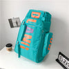 A teal backpack featuring orange text and skateboard straps, displayed on a white surface.