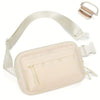 A light beige waterproof crossbody waist bag with an adjustable strap and a separate small pouch.