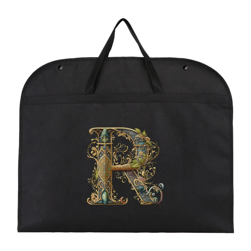 Black fabric dust cover and storage bag featuring an ornate gold and green letter R design