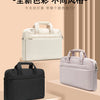 A display of new color laptop sleeves in white, black, and light purple shades.