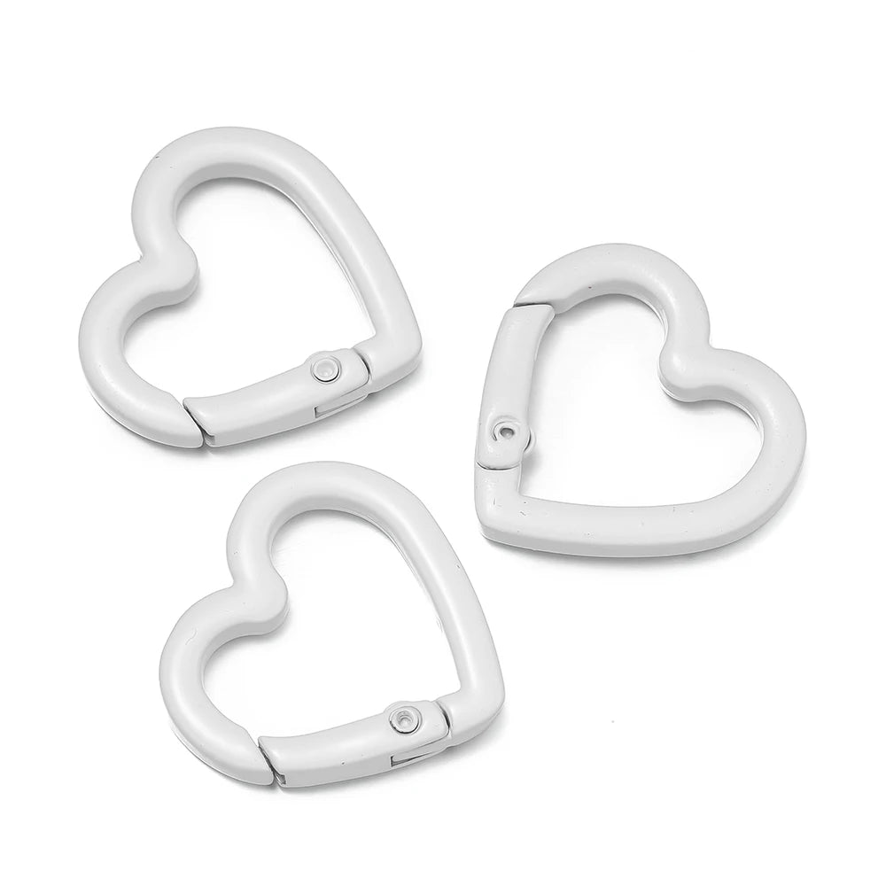 Three white heart-shaped metal spring clasps for DIY jewelry and keychains