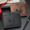 A set of brown and black embossed PU leather slim wallets and a pen displayed on a dark surface.