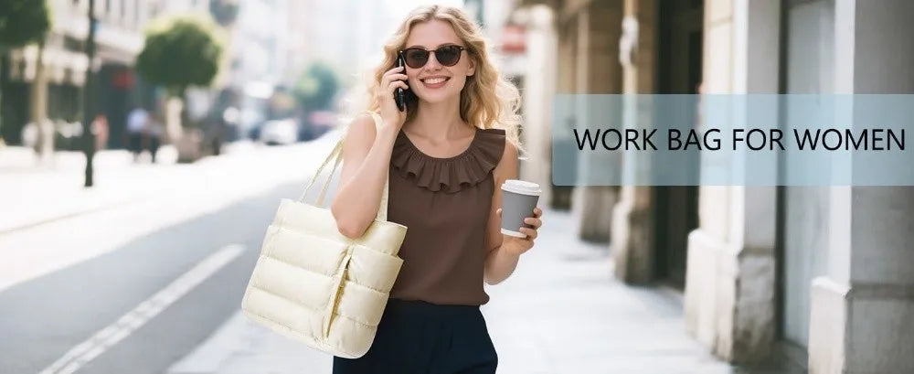 A woman wearing a brown top and dark pants is holding a cream quilted puffer tote bag on a city sidewalk.