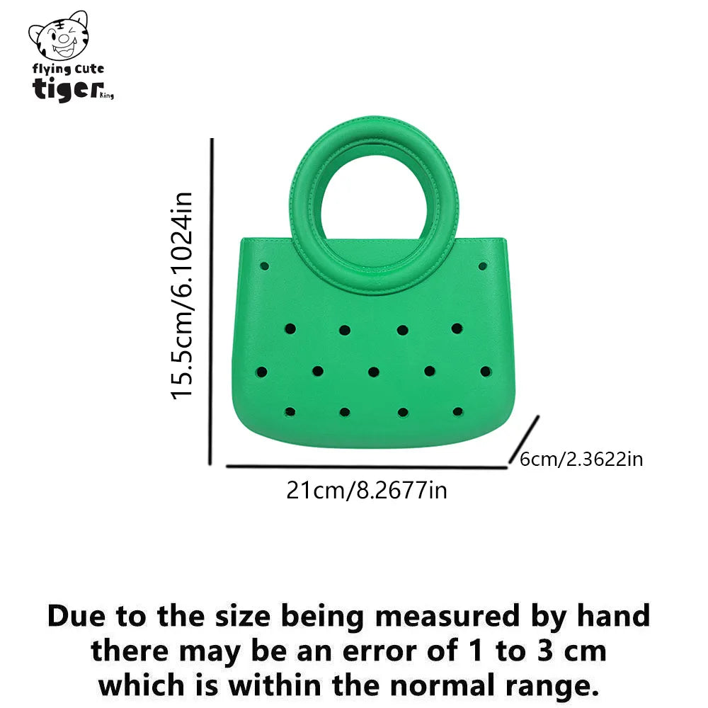 A bright green round PVC handbag featuring a grid of small holes and a loop handle.