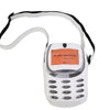 A white vintage Y2K telephone backpack with a coiled cord and keypad visible.