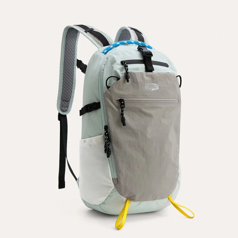 A light blue and gray durable laptop backpack with black straps and features.