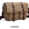 A tan canvas messenger bag with brown leather straps shown from the front.
