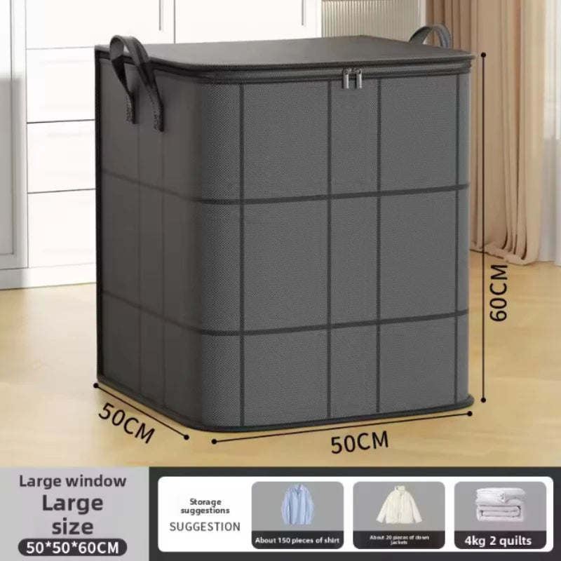 Grand sac de rangement pour vêtements gris résistant, pliable avec couvercle et poignées, posé sur un plancher en bois.