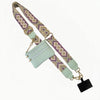 A light mint green phone lanyard featuring a patterned strap and a detachable leather wallet.
