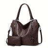 A dark brown women's PU leather crossbody tote bag with a flap and zippered details.