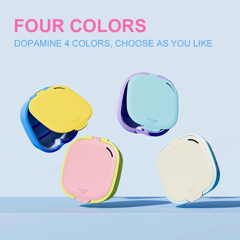 Four colorful denture storage boxes, including yellow, light blue, pink, and cream, displayed on a light blue surface.