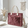 Sac en velours côtelé marron à pois blancs et anses beiges sur une surface en bois blanc.