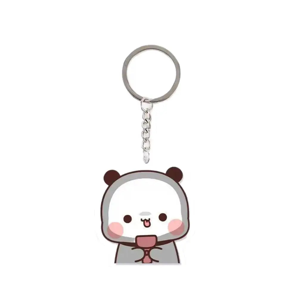A cute cartoon panda charm keychain with a silver ring.