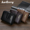 A set of three brown and black PU leather card holder wallets displayed on a dark wooden surface.
