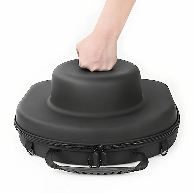A hand is opening a black durable EVA hard shell hat case.