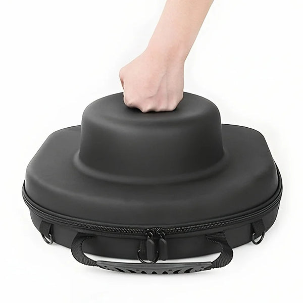 A hand is opening a black durable EVA hard shell hat case.