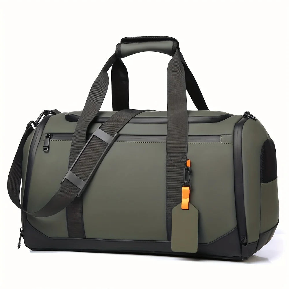 Grand sac de voyage olive avec anses noires et étiquette orange.
