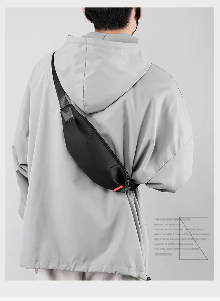 Gray water-resistant nylon jacket with a black waist bag worn on the back