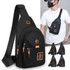 Black compact oxford crossbody sling bag with orange accents shown next to a person