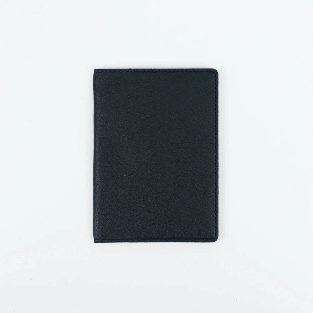 A dark navy blue customizable PU leather passport holder displayed flat.