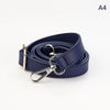 A dark navy blue PU leather strap with a silver clasp and lobster claw buckle rolled up.