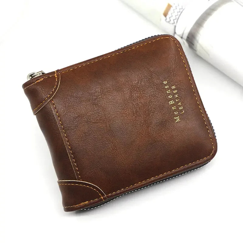 A brown men's vintage PU leather zipper card wallet resting on a white surface.